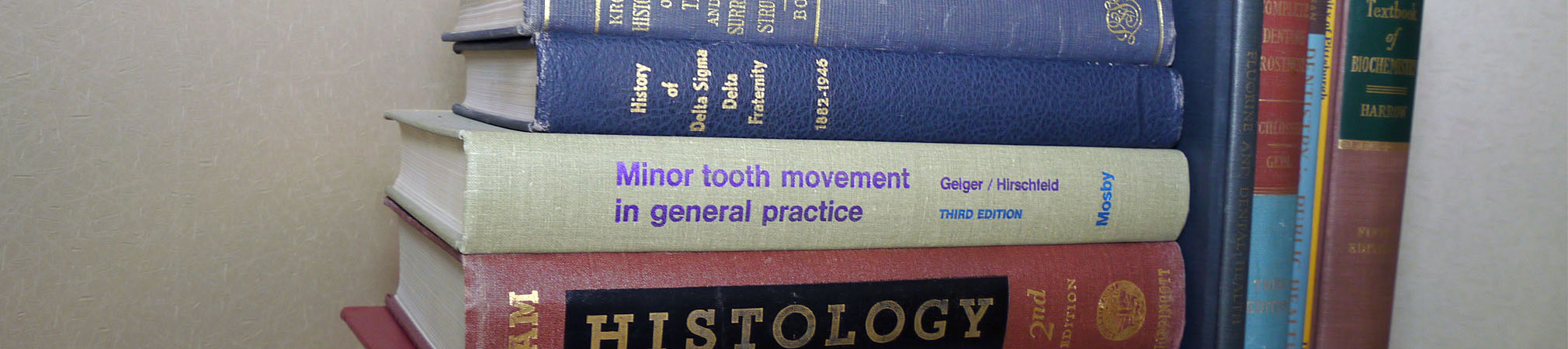 A collection of different books on dental history and practice